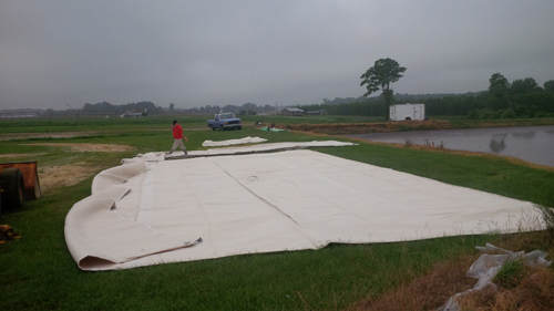 Geotextile dewatering bags on a farm
