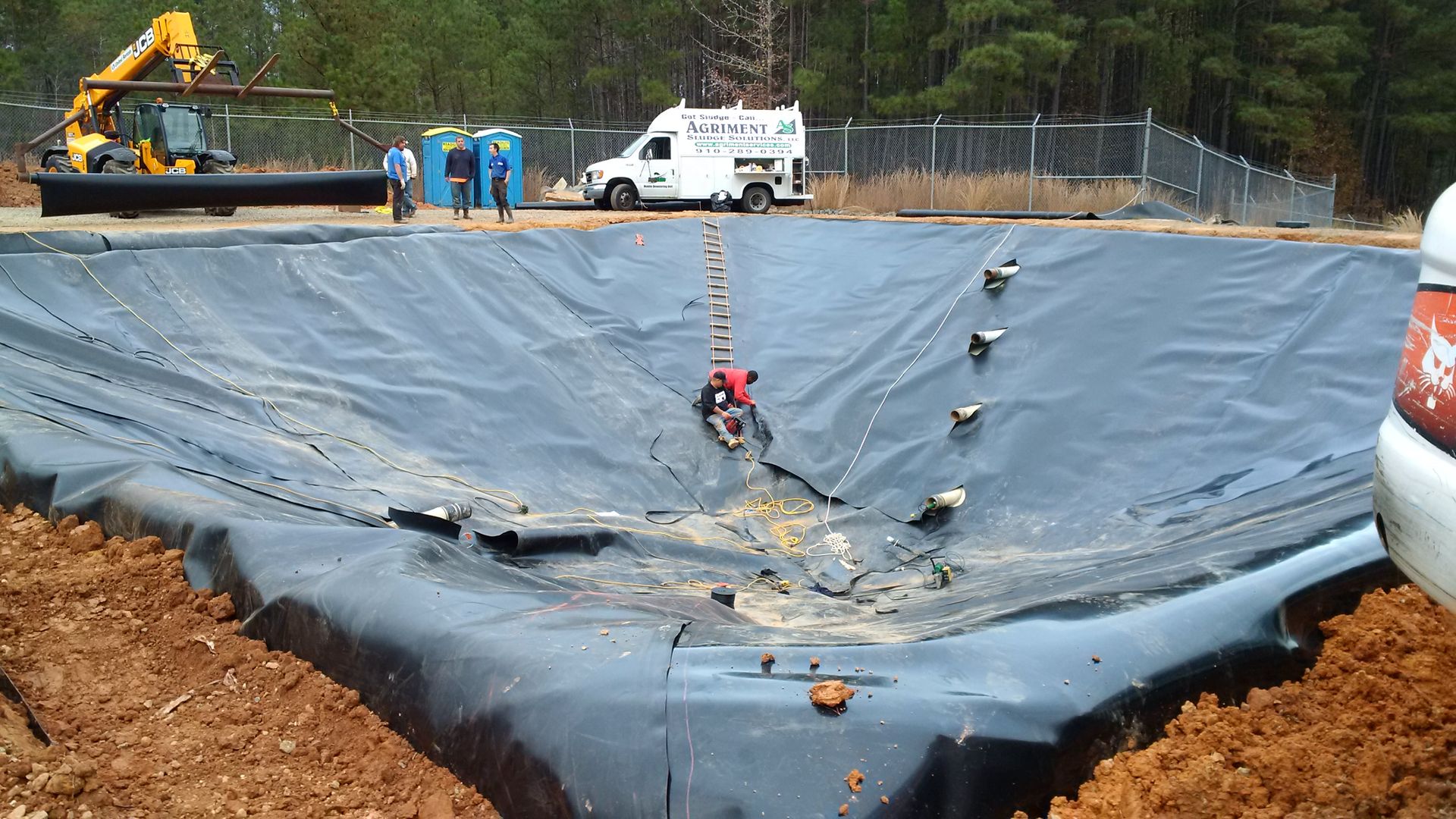 Lagoon liner installation, eastern North Carolina